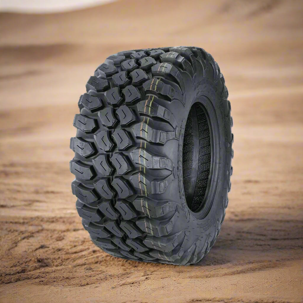 A black Wanda ATV tyre with a deep tread pattern, designed for off-road use.